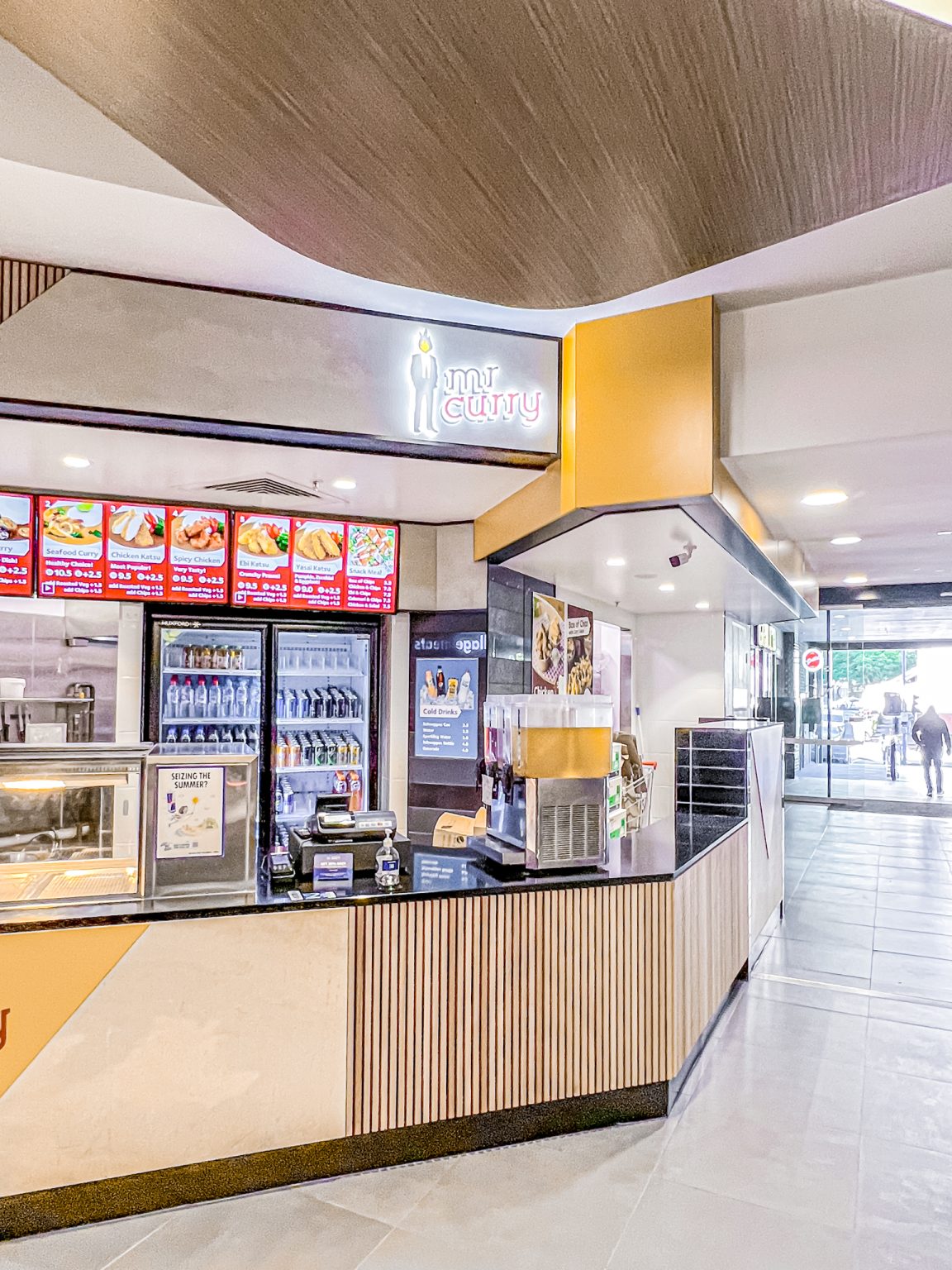 Mr Curry storefront and service counter